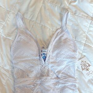 BECCA white one piece swimsuit